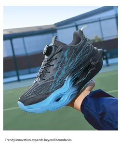 Detail view of grey and blue cushioned running shoes with rotary dial lacing system.