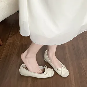 Elegant French style beige ballet flats with bow detail and hidden wedge heel for women