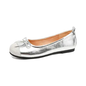 Elegant silver metallic ballet flats with bow detail and soft flexible sole for women