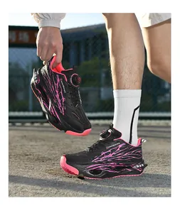 Close-up of black running shoes with pink lightning patterns and dial lacing.