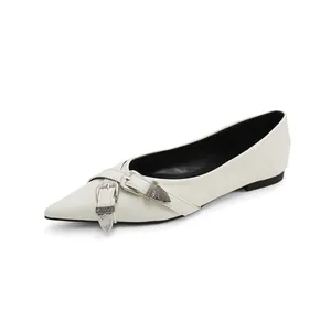 Elegant white pointed-toe flats with decorative vintage silver-tone buckles for women
