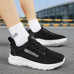 Lightweight black marathon running shoes with breathable mesh and thick white soles