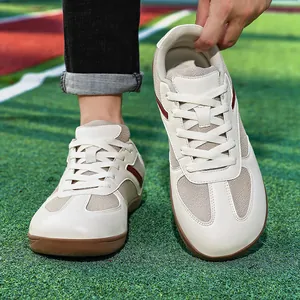 Zapatos deportivos GAT de cuero blanco con punta ancha y suela de goma marrón resistente