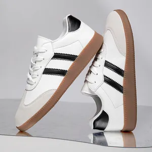 Retro white German Army Trainers with black stripes and gum sole for men and women