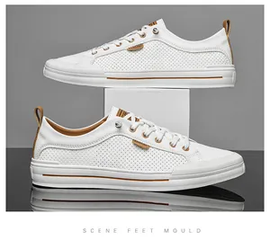 Baskets blanches de haute qualité en cuir perforé pour homme avec accents marron et reflet