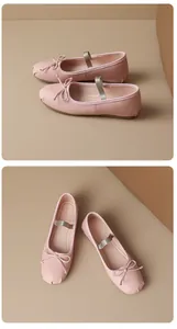 Detail view of pink ballet flats featuring a delicate bow and an elastic silver strap.