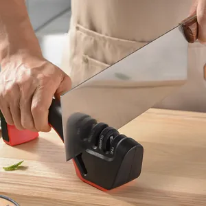 Ergonomic 3-stage manual knife sharpener for stainless steel kitchen knives on a wooden board