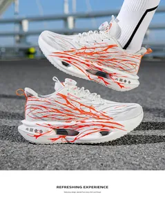 Detail view of white breathable running shoes featuring orange flame patterns and hollow soles