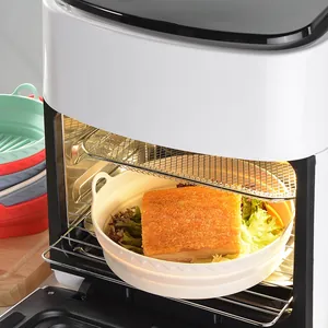 Panier de friteuse à air pliable en silicone de qualité alimentaire dans une friteuse