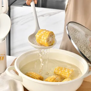 Juego de utensilios de cocina de silicona blanca resistente al calor con espumadera