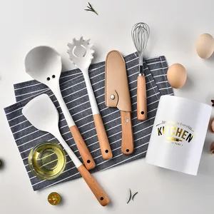 Juego de 6 utensilios de cocina de silicona blanca con mangos de madera y bote