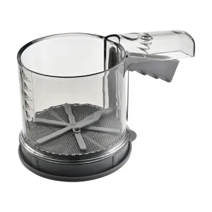 Semi-automatic handheld flour sifter with measurement markings for baking.