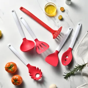 Professional 6-piece heat-resistant red and white silicone kitchen utensil set on marble