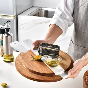Nordic style marble and acacia wood spliced serving board for cheese steak and fruit