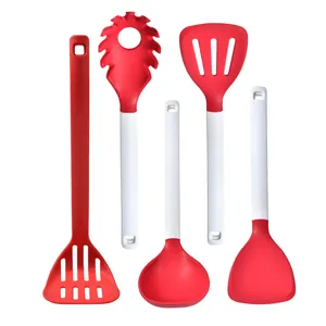 Heat-resistant red and white silicone kitchen utensils 5-piece set on white background