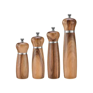 Adjustable acacia wood manual pepper and spice grinder set in four varied heights