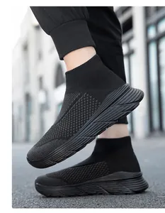 Detail view of black ultra-light high-top flying woven sock sneakers for athletic casual wear.