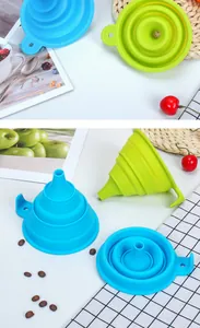 Detailed view of blue and green collapsible silicone kitchen funnels for liquids