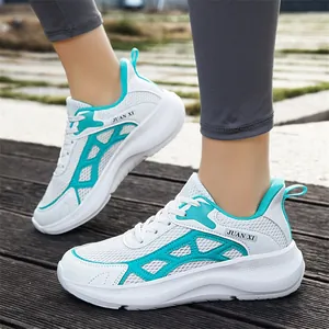 Breathable white mesh sneakers with teal accents and thick lightweight soles