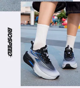 Action shot of ultra-light professional running shoes with gradient blue design and thick soles