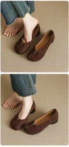 Brown tabi split-toe ballet flats with chunky mid-heel and decorative knot detail