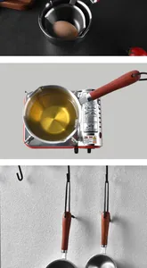 Detail of a 304 stainless steel oil heating pot with a heat-resistant wooden handle.