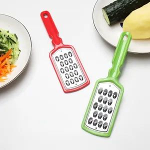 Râpe à fromage et citron manuelle en acier inoxydable avec poignées ergonomiques