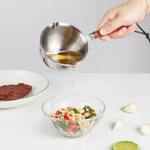 304 stainless steel mini oil pouring pot with ergonomic wooden handle for kitchen use