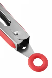 Detail view of red silicone kitchen food tongs featuring a pull-to-lock storage ring mechanism.