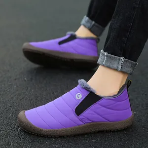 Waterproof purple slip-on snow boots with warm faux fur lining for winter outdoor wear