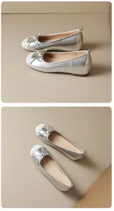Silver French style ballet flats with bow detail and hidden wedge heel.
