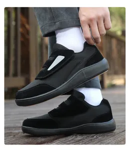 Detailed side view of black breathable mesh Velcro walking shoes for middle-aged men
