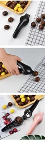 Detailed view of manual chestnut opener tool showing sharp cross blade and ergonomic handles