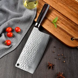 Professional forged Chinese chef knife with hammered finish and ergonomic wooden handle.