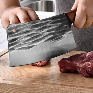 Professional heavy duty forged meat cleaver with hammered wave texture on wooden cutting board