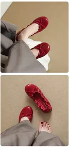 Close-up of red French ballet flats featuring elegant bow knot and comfortable soft sole