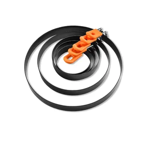 Set of four non-stick stainless steel round egg rings with orange silicone handles