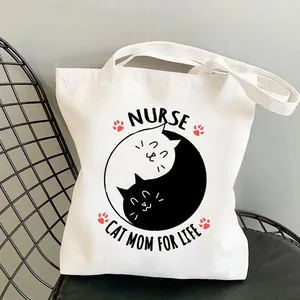 Weiße Canvas-Einkaufstasche Nurse Cat Mom for Life mit minimalistischem Yin-Yang-Katzenprint
