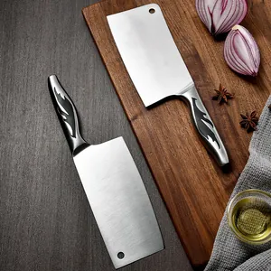 Professional stainless steel kitchen knife set on a wooden cutting board with spices