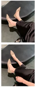 French nude pointed-toe flats for women featuring an elegant hollow side design.