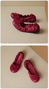 Close-up of elegant magenta French ballet flats with bow detail and soft sole
