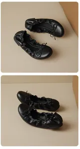 Detail shots of black French ballet flats with bow and elastic scrunch trim