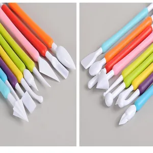 Detailed macro view of 9-piece colorful fondant sculpting tools for professional cake modeling