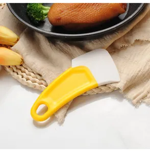 Raschietto da cucina versatile in silicone giallo e bianco per pulizia e rimozione dell'olio