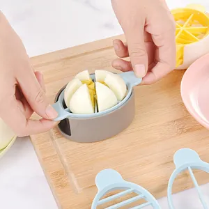 Cortador de huevos manual de plástico con 6 cuñas para preparar alimentos eficientemente