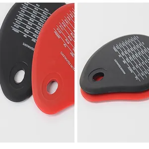 Detail view of silicone scraper with precise measurement equivalent chart.