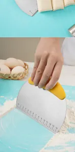 Close-up of semi-circular stainless steel dough scraper with scale for baking