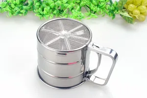 Close-up of a professional stainless steel manual flour sifter showing the fine mesh detail.