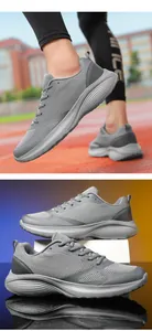 Close-up detail of gray breathable mesh men's running shoes with cushioning sole