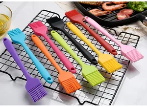 Detailed view of 9 colorful heat-resistant silicone basting brushes for BBQ and baking